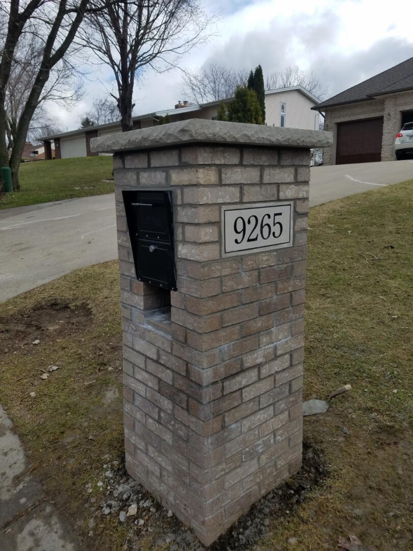 Brick-walled post for front gate intercom